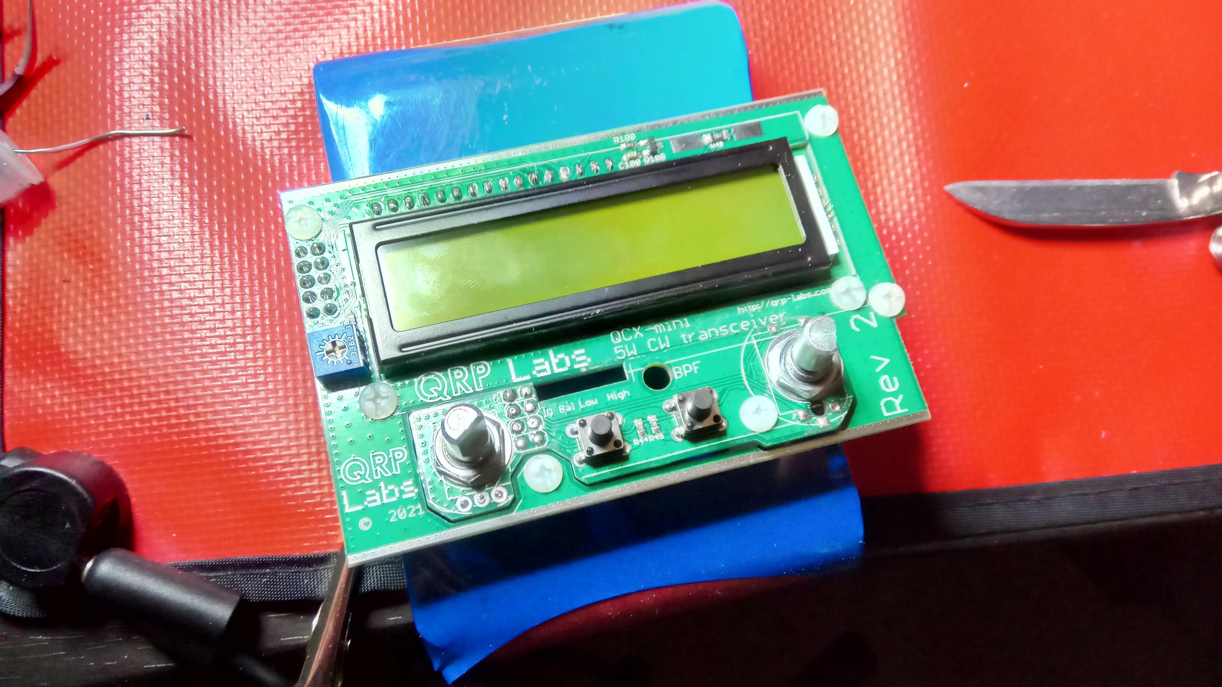 Make sure control board squeezes through the hole in the display board